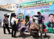 Humanis dan Unik, Ditlantas Polda Riau Gratiskan Potong Rambut Ojol di Jalan Sudirman